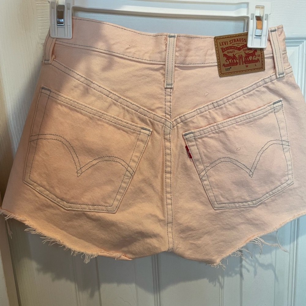 Never worn Levi’s Pink 501 shorts